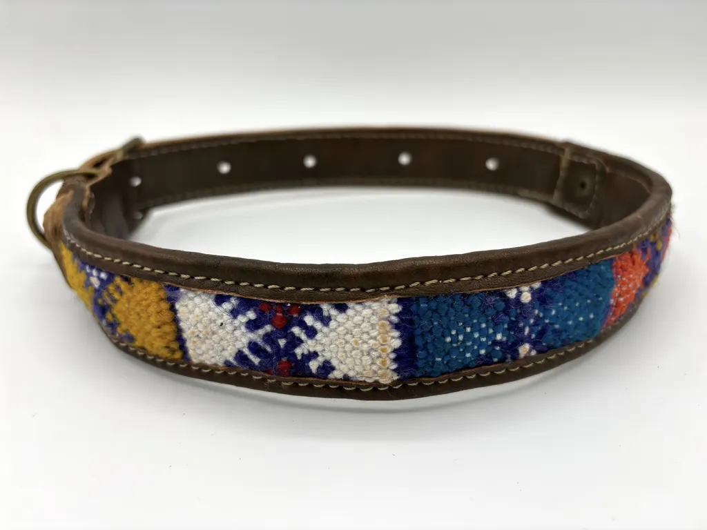 Caravan Dreams collar at an angle showing cobalt, saffron and white weave